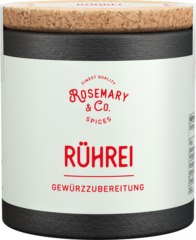 Dose Rosemary & Co. Große Gewürze auf Holz, daneben verschiedene Gewürze und Samen4
