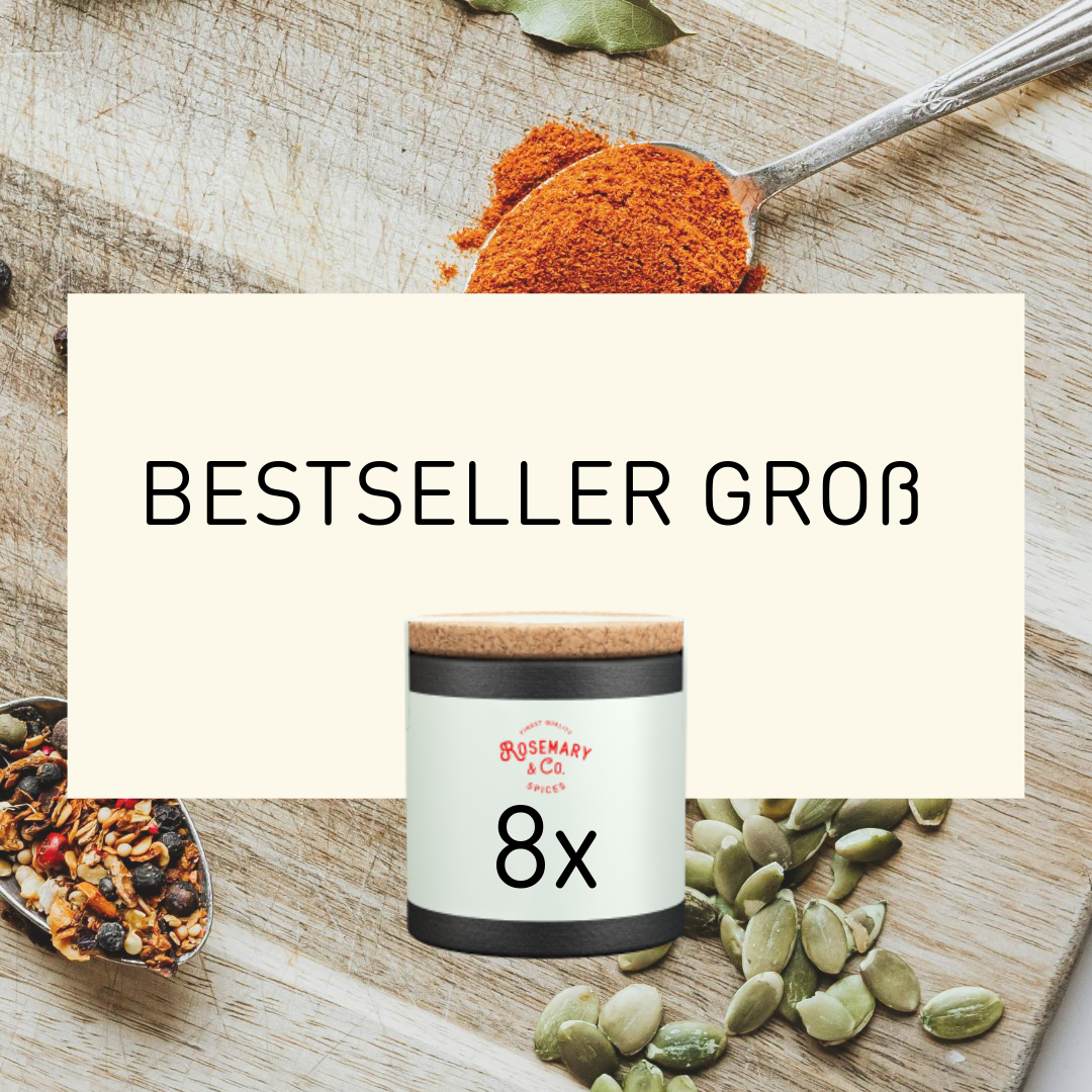 Dose Rosemary & Co. Große Gewürze auf Holz, daneben verschiedene Gewürze und Samen