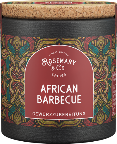 Bunte Pappdose mit der Aufschrift "Rosemary & Co Spices African Barbecue Gewürzzubereitung", mit Korkdeckel.